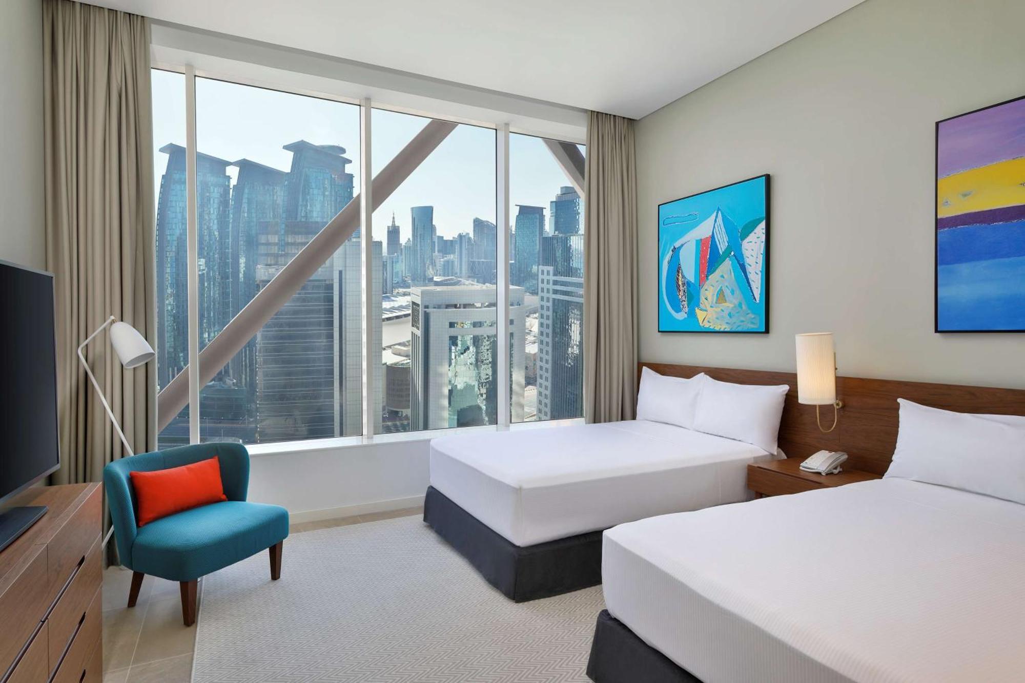 Aleph Doha Residences, Curio Collection By Hilton Ngoại thất bức ảnh A guest room at the hotel