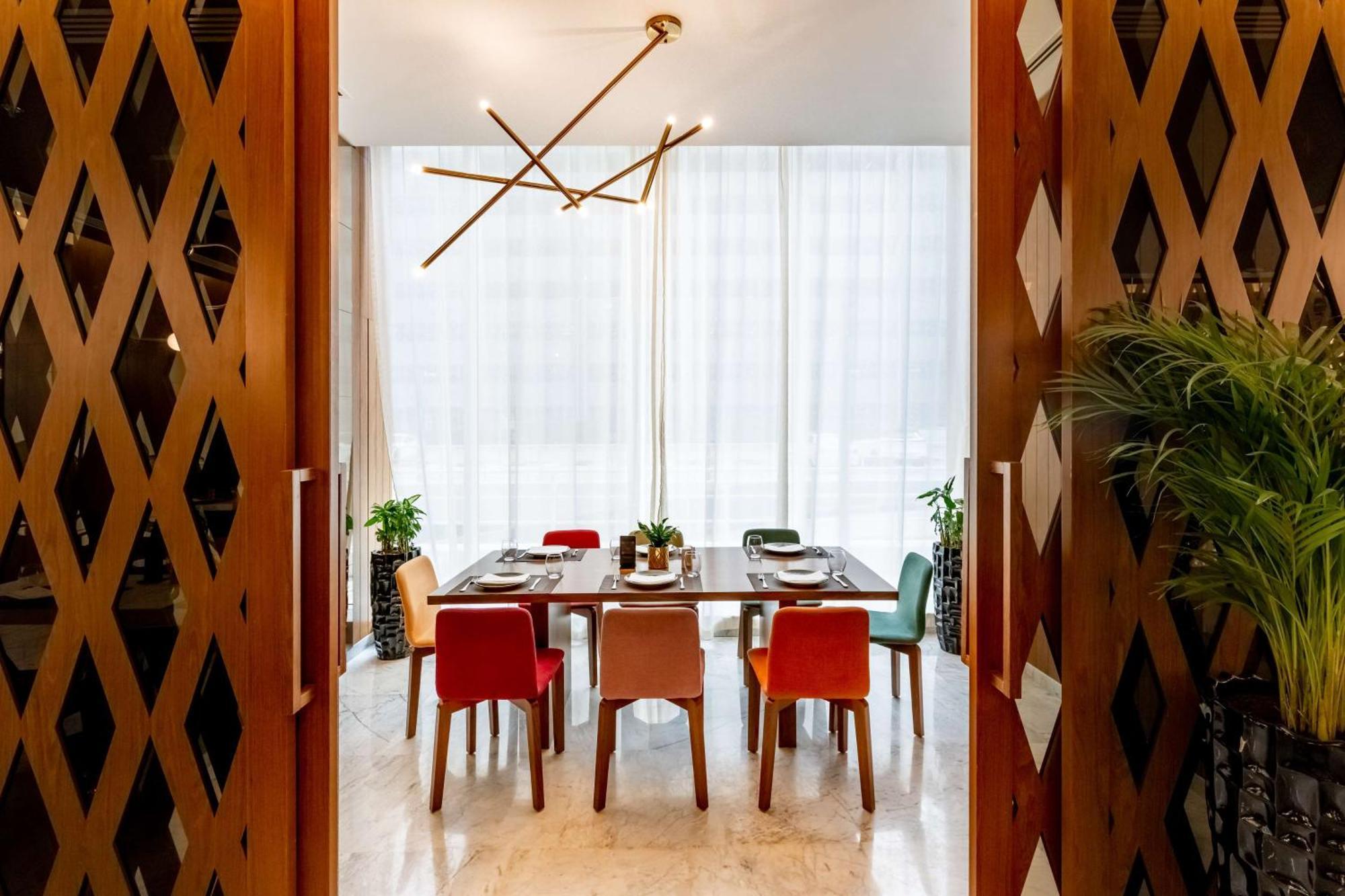 Aleph Doha Residences, Curio Collection By Hilton Ngoại thất bức ảnh Dining room