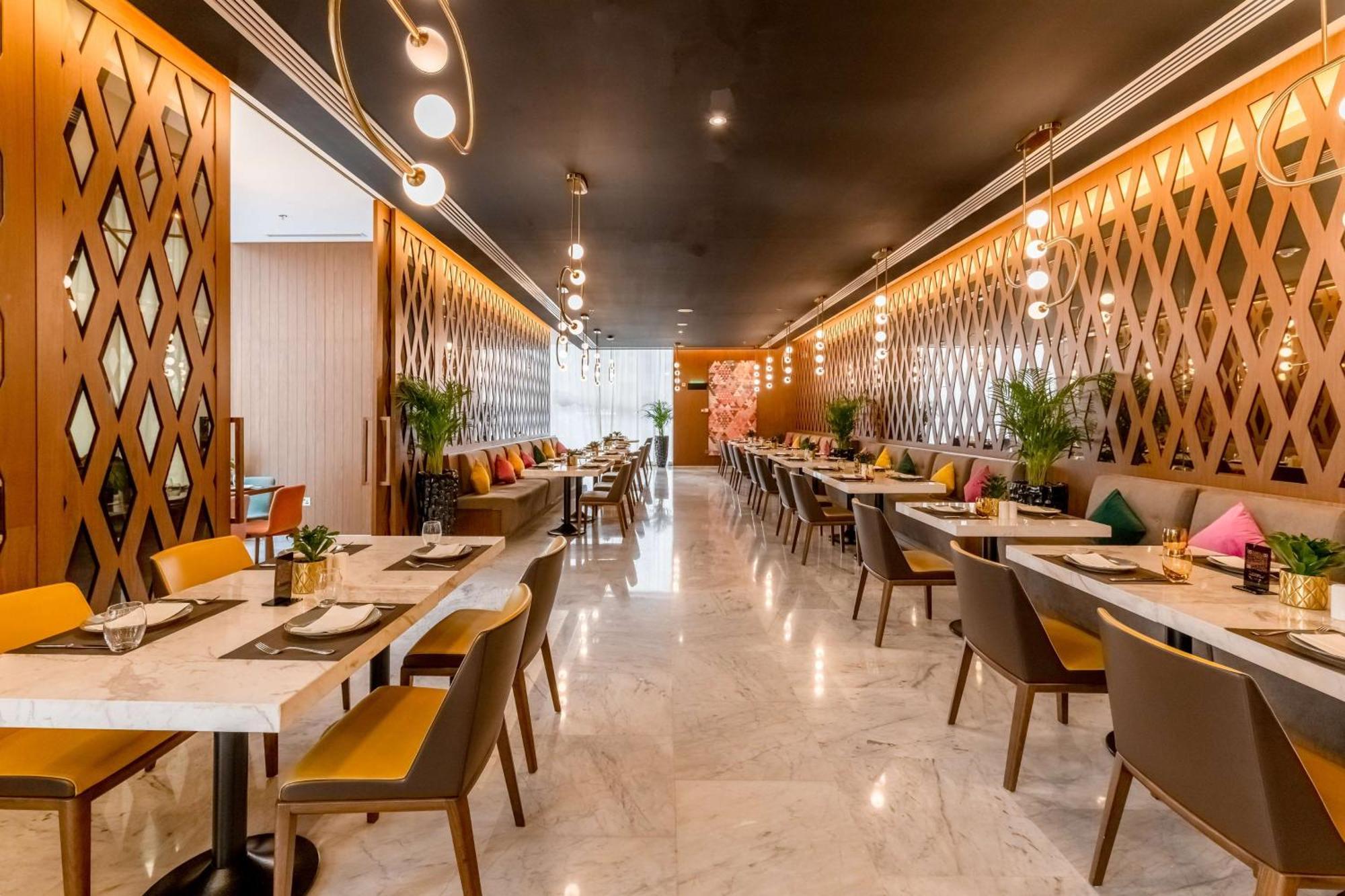 Aleph Doha Residences, Curio Collection By Hilton Ngoại thất bức ảnh The interior of the restaurant